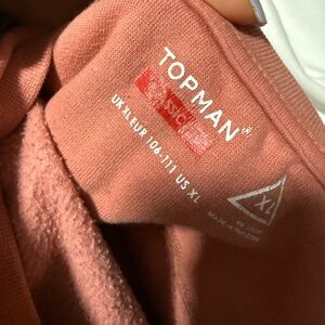 Creamy pink sweater, size- XL and the brand TOPMAN. there’s only one tiny stain